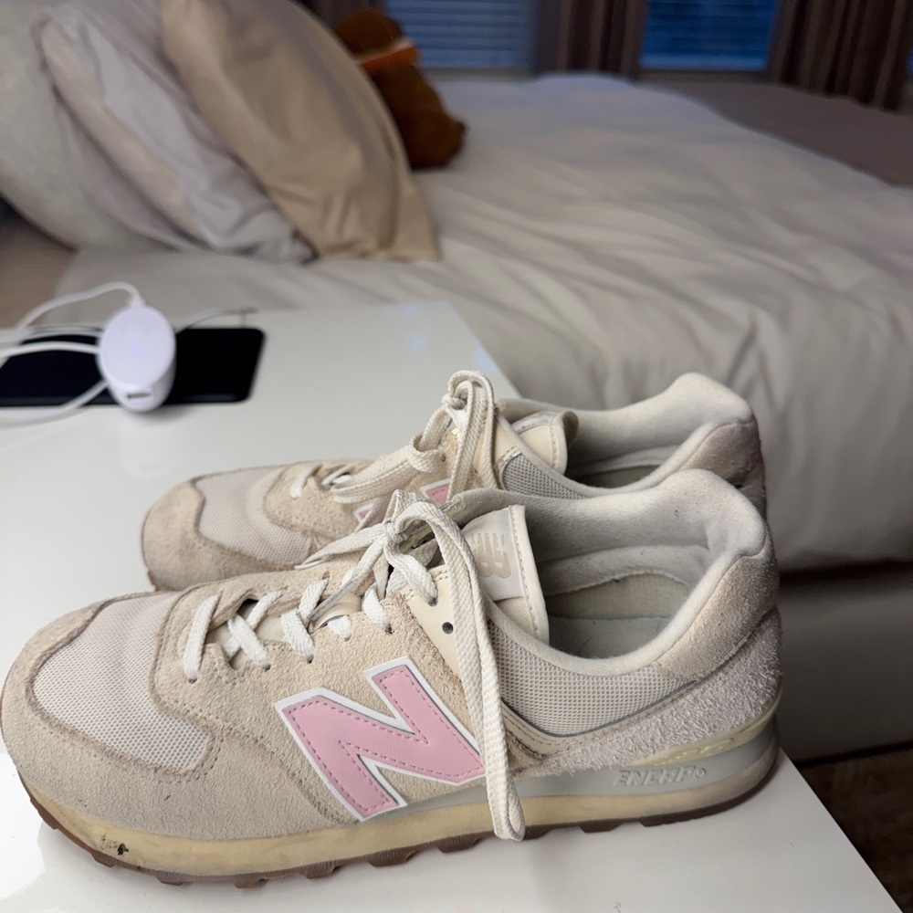 New balance 574 pink sneakers worn as pictured